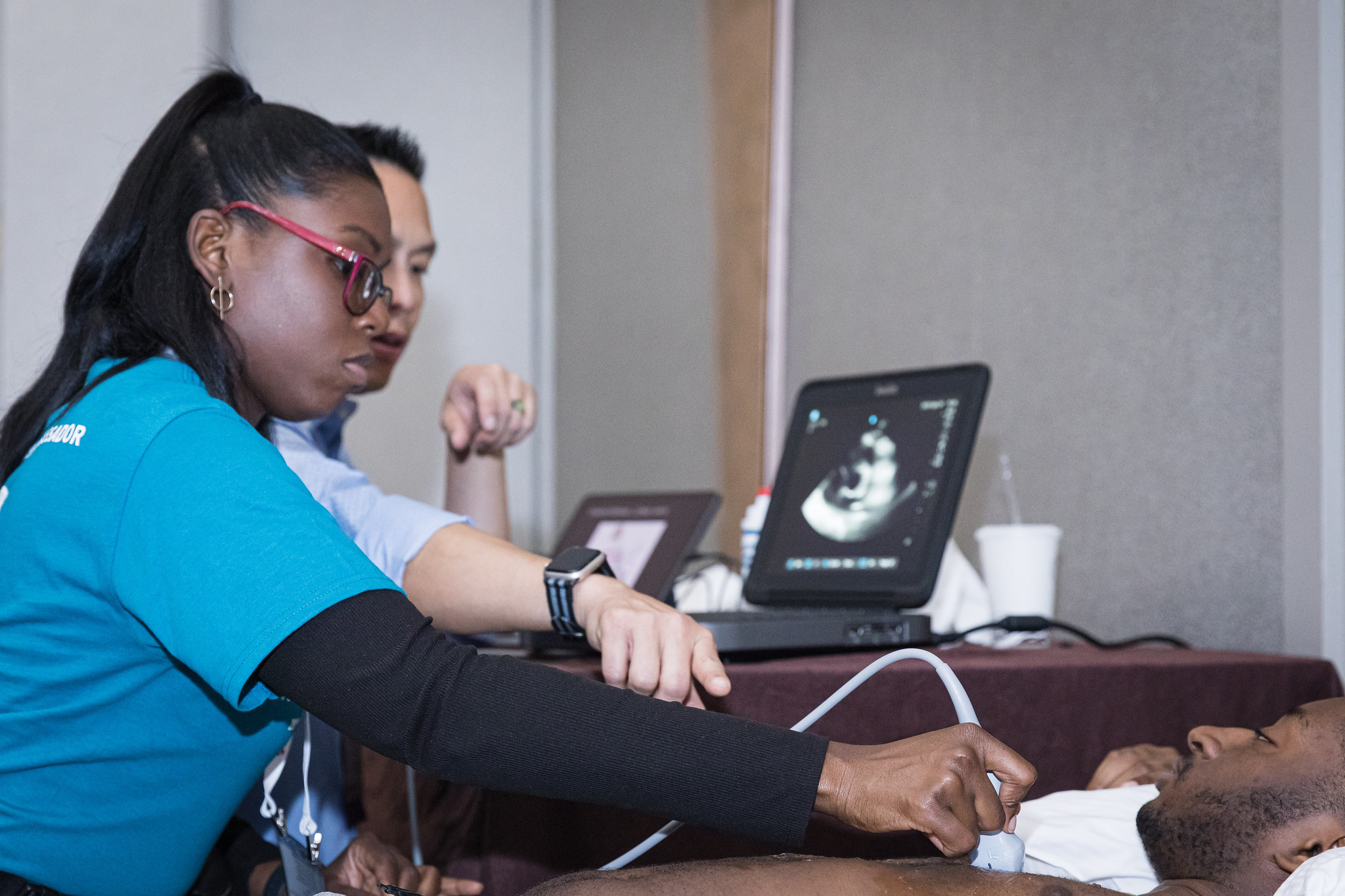 Emergency physicians participating in a simulation-based training session for the AAEM Certifying Exam Review Course.