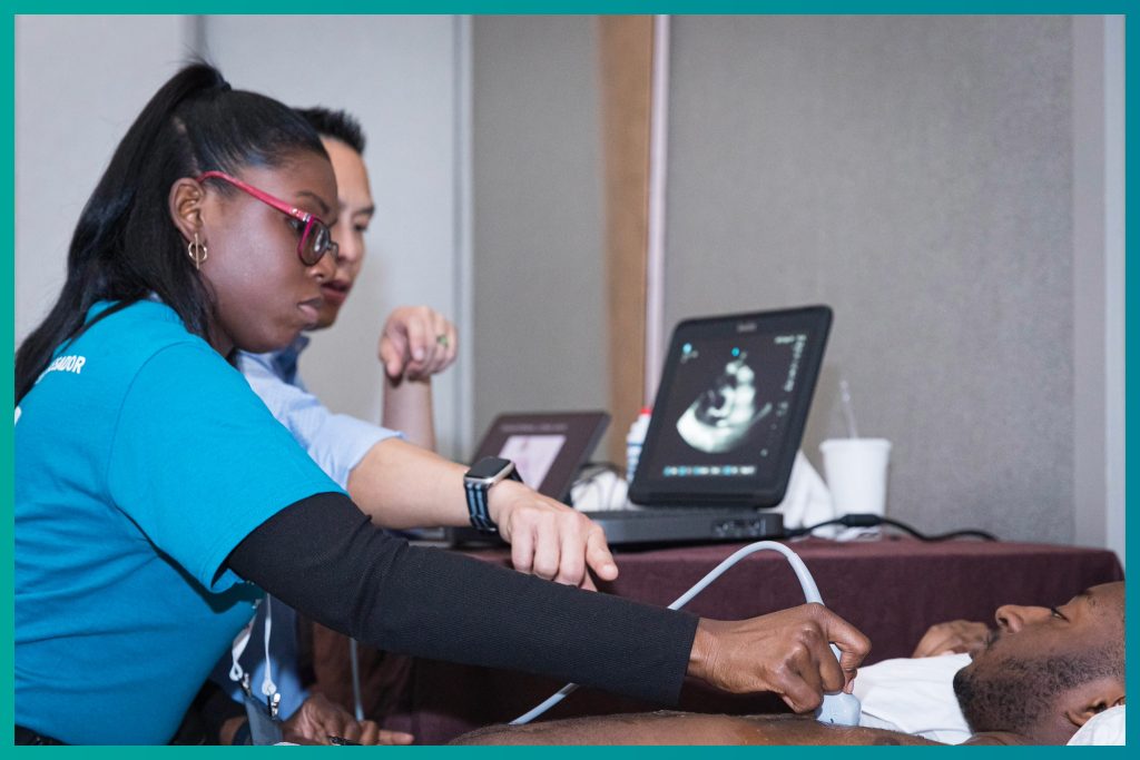 Emergency physicians participating in a simulation-based training session for the AAEM Certifying Exam Review Course.